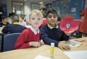 School children making poppies